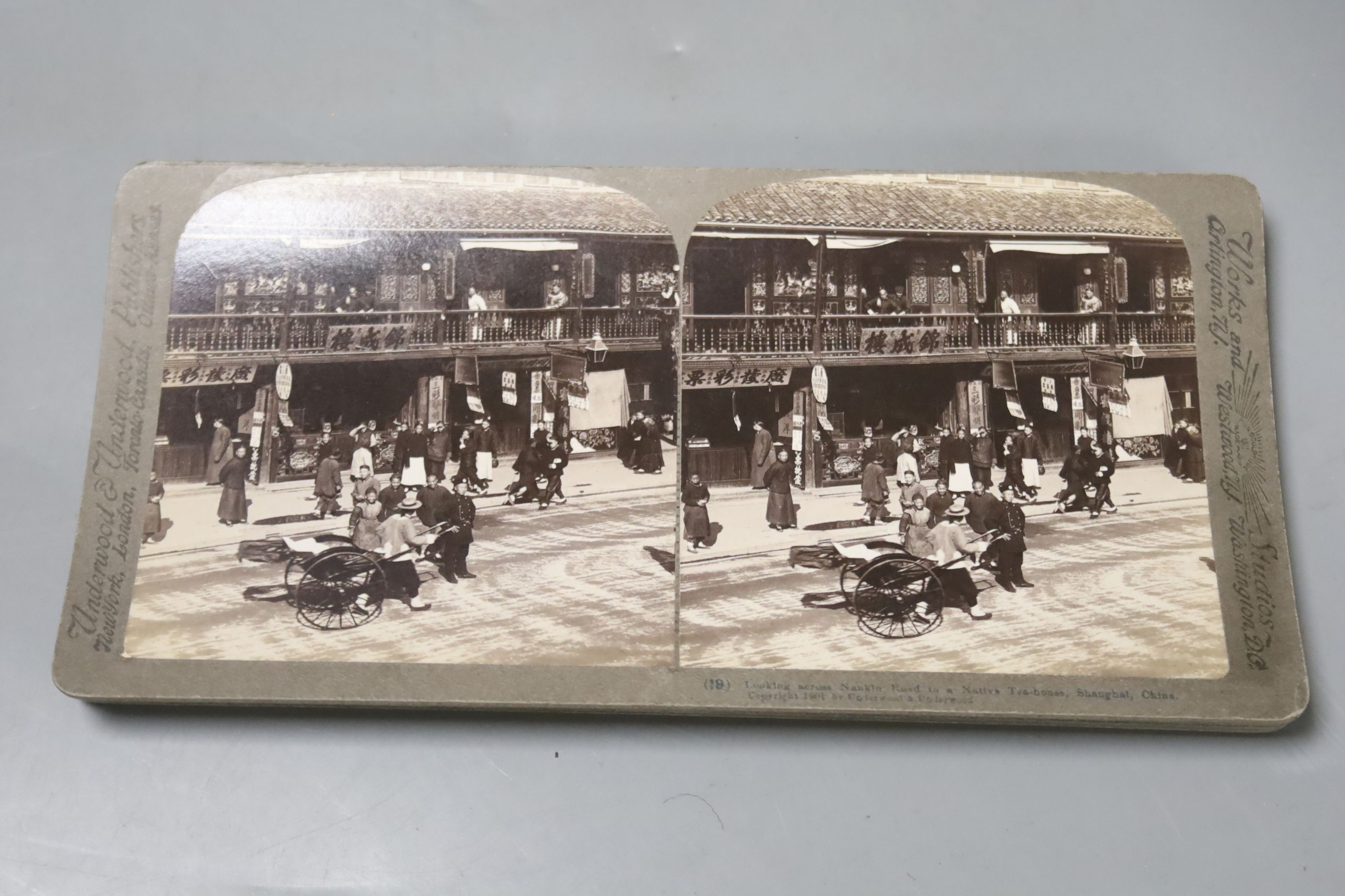 A 'Sun Sculpture' stereoscopic viewer and a large collection of Underwood and Underwood stereoscopic cards, many depicting Chinese